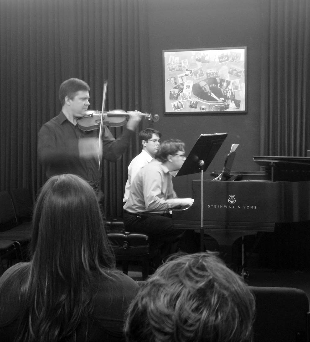 Eric Lawson and João Paulo Casarotti performing Mahle's music at a concert in Steinway Hall, New York, NY